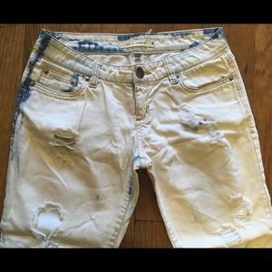 Like new bleached denim - distressed blue to white